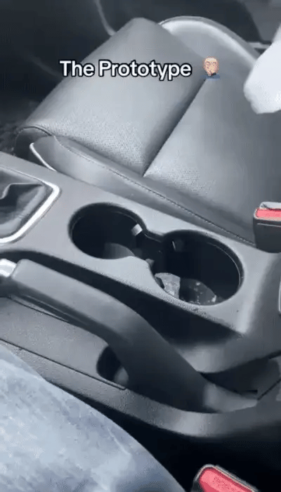 Smart car cup warmer by My Store, showing a sleek device placed inside a car cup holder for keeping drinks warm.