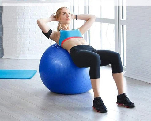 LORDEX fitness gym ball for exercise and stability training, blue rubber exercise ball on a gym floor